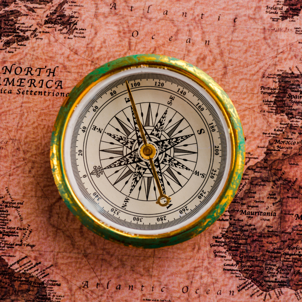 Compass on a world map