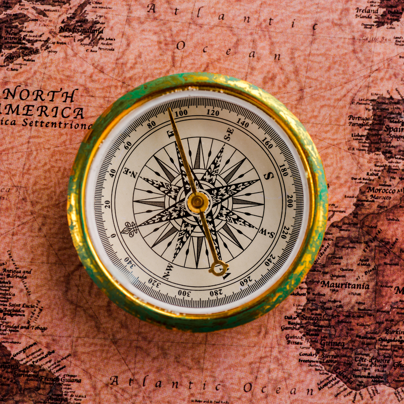 Compass on a world map